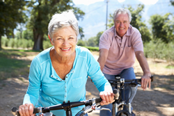 Older couple riding bikes